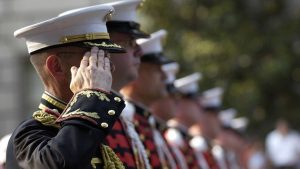 Soldiers inline saluting